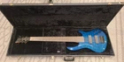 Dean Edge Q6 Transparent Blue 6-STRING Electric Bass With Case Used. Price: $485.00.