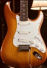 94 Fender Strat STR-93LS Lace Sensors Japan Light Amber Burst Used. Price: $1199.00.