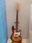 Fender American Deluxe Jazz Bass Ash Tsb/r Sunburst Usa '07 Electric Guitar Used. Price: $1446.00.