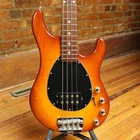Ernie Ball Music Man Sterling 4 1998 Honey Burst Used. Price: $1595.00.
