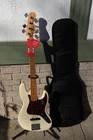 New Fender Player Plus Active Jazz Bass With Gig Bag Olympic Pearl Open. Price: $819.00.