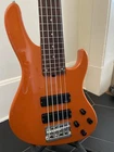 Sadowsky Metroexpress 24-FRET Modern Bass, Roasted Maple, 5-STRING Candy Orange Open. Price: $900.00.