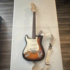 Squier Strat Electric Guitar Sunburst Solid Body 6-STRING Maple Rh W/ Strap 2015 Used. Price: $100.00.