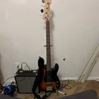 Squier Precision Bass Guitar 4 String Sunburst W/ Amplifier & Strap Used. Price: $250.00.