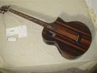 Michael Kelly Dragonfly Fretless Bass Acoustic Electric Guitar Java Ebony New. Price: $630.00.