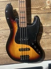 Squier Custom Jazz Bass Upgraded- 3 Tone Sunburst W/fender Gig Bag Used. Price: $449.00.