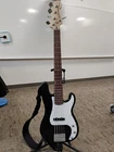 Squier Precision Bass 20TH Anniversary 5-STRING Rh Electric Used. Price: $380.00.