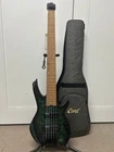 Cort Artisan Space 5 Headless String Bass Guitar - Star Dust Green New. Price: $849.99.
