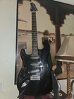 Sawtooth 6-STRING Electric Guitar Black (st-es-lh-bkb) Used. Price: $99.00.