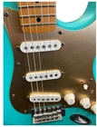 Squier 40TH Anniversary Stratocaster Vintage Edition Seafoam Green Open. Price: $389.00.
