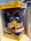 Royal Furby Your Majesty King Limited Edition 2000 W/ Box Tags Instruction Used. Price: $105.00.