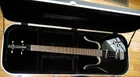 Danelectro Longhorn Electric Bass Guitar - Black Hard Case Near Mint Early 2000S Used. Price: $899.00.