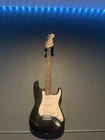 Squier By Fender Affinity Stratocaster Electric Guitar Black W/ Gig Bag & Strap Open. Price: $320.00.