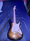 Squier Stratocaster 2007 Sunburst Electric Guitar Maple Neck Rh 6-STRING Strap Used. Price: $125.00.