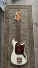 Squier Mustang Bass Electric 4-STRING Guitar White Right-handed Used. Price: $300.00.