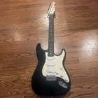 Fullerton" Electric Guitar Black White Used. Price: $125.00.