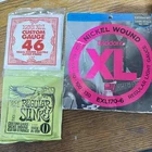 Ernie Ball Regular Slinky Nickel Wound Guitar Strings 2221 + 46 EXL170-6 Nip New. Price: $30.00.