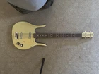 Danelectro Solid Body Cream 4-STRING Electric Bass Guitar Used. Price: $450.00.