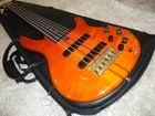 Vintage 1990 Yamaha TRB6-NO Strings Bass Guitar Orange. Aguilar OBP3 Pre Amp Used. Price: $2750.00.