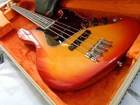 2019 Fender Rarities American Ash Flame Top Jazz Bass Guitar, Plasma Red Burst Used. Price: $1749.99.