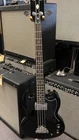 SI06100469, Ebony Epiphone EB-0 Bass Guitar Made In October 2006. With Soft Case Used. Price: $289.40.