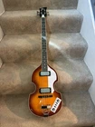 Rogue VB100 Violin Bass Guitar Vintage Sunburst Open. Price: $199.00.