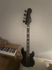 Fender Duff Mckagan Deluxe Precision Bass Guitar - Black Open. Price: $1000.00.