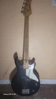 Vintage First Act Black Cherry Fleck/mother Of Pearl 4 String Bass Guitar Used. Price: $80.00.