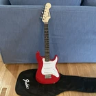 Squier Red 3/4 Mini Solid Body Electric Guitar Right-handed 6-STRING W/ Gig Bag Used. Price: $80.00.