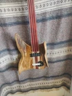 Right-hand Fretless String Sculpted Hollow Maple Log Wishbass 34" Scale New. Price: $250.00.