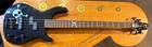 Squier Bass Guitar Skull & Cross Bones Good Condition Prosetup Case Used. Price: $275.00.