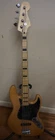 (RI4) Fender Squire Jazz Bass Electric Guitar Natural Used. Price: $299.99.