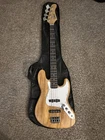 Squier Classic Vibe '70S 4-STRING Solid Body Natural Bass Guitar W/ Gig Bag Used. Price: $359.96.