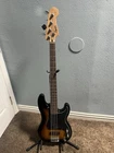 Squier Precision Bass 4-STRING Right-handed Solid Body Electric Sunburst New. Price: $250.00.