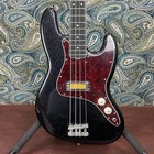 Fender Limited Edition Gold Foil Jazz Bass Black Sparkle New. Price: $1299.99.