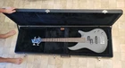 New Mitchell MB100CS Short Scale Solid Body Electric Bass + Used Case. Price: $324.99.