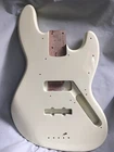 Squier Classic Jazz Bass Guitar Body Olympic White Vg Lbs 14 Oz. Used. Price: $129.00.