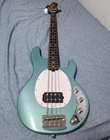Sterling By Musicman RAY34 Electric Bass Guitar W/ Gig Bag Used. Price: $1185.00.
