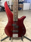 Yamaha TRBX174 Rm 4-STRING Electric Bass Guitar Right-hand, Red Metallic Used. Price: $220.00.