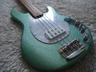 Sterling By Music Man Stingray RAY34 Seafoam Sparkle Green Bass Guitar. Used. Price: $799.99.