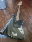 Squier Jaguar Bass 4-STRING Solid Body Electric Guitar Black W/ Strap Used. Price: $250.00.