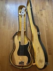 Vintage Hondo Bass Guitar With Hard Case Used. Price: $324.00.