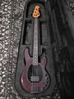 Ernie Ball Music Man Dark Ray 4 Bass Guitar - Rainbow Used. Price: $2300.00.