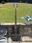 Used Epiphone Les Paul Electric Bass With Hardshell Case. Price: $549.00.