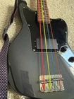 Squier Jaguar Bass - Charcoal Frost Used. Price: $299.00.