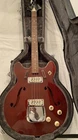 Harmony H420 4-STRING Bass Guitar With Dearmond Goldfoil Rosewood Fretboard Used. Price: $2499.99.