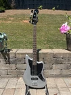 Used Squier Vintage Modified Jaguar Bass Guitar. Price: $329.00.