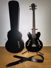 Epiphone Rivoli Semi-hollow Body Bass Guitar With Case Used. Price: $1350.00.