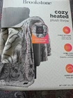 Brookstone Cozy Heated Electric Plush Throw Blanket 4 Settings 50X60" New. Price: $34.99.