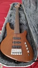 Status Graphite Barracuda 5 String Bass Guitar 2001 Used. Price: $1250.00.